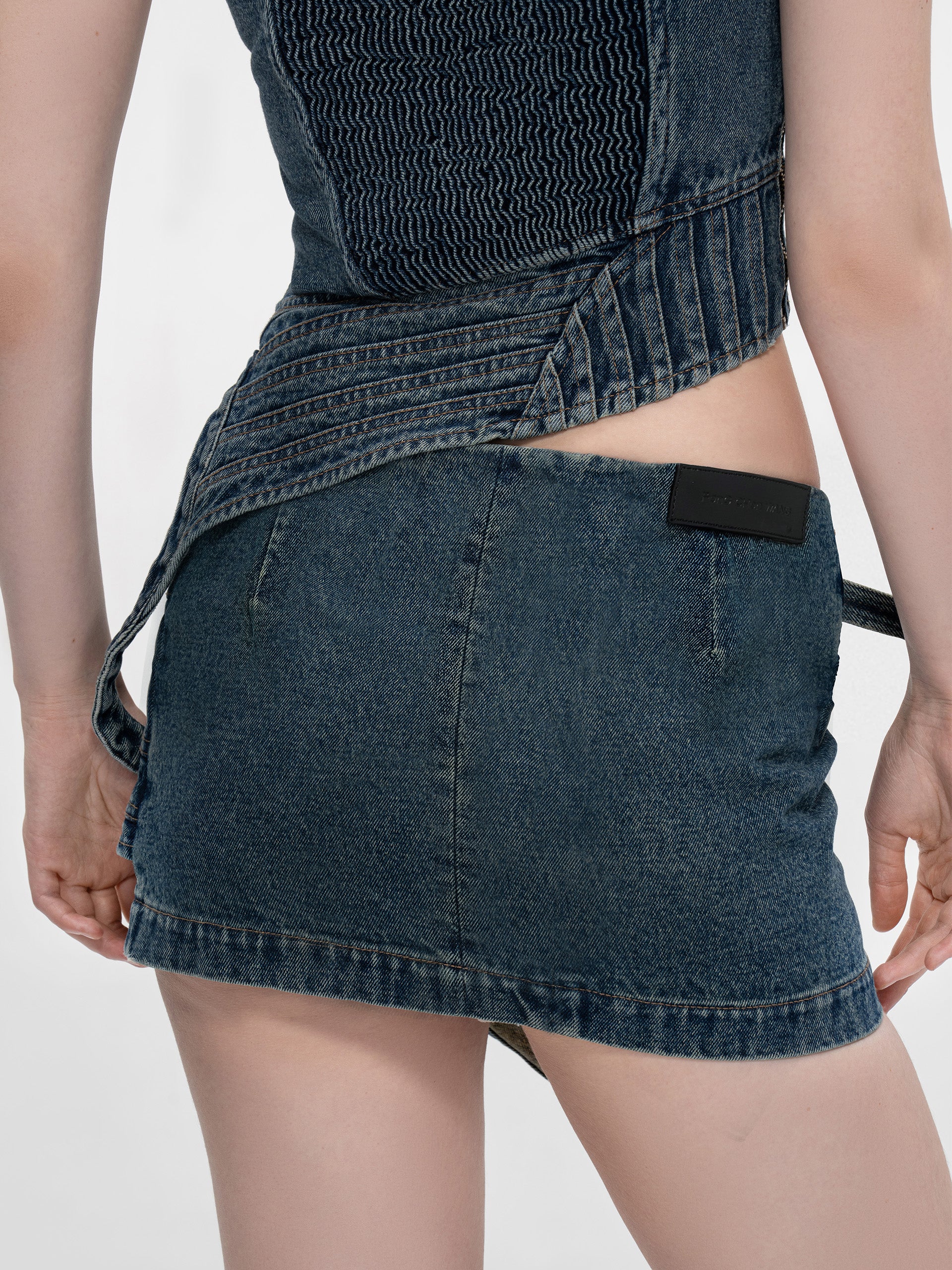MULTI SEAM MINI SKIRT
