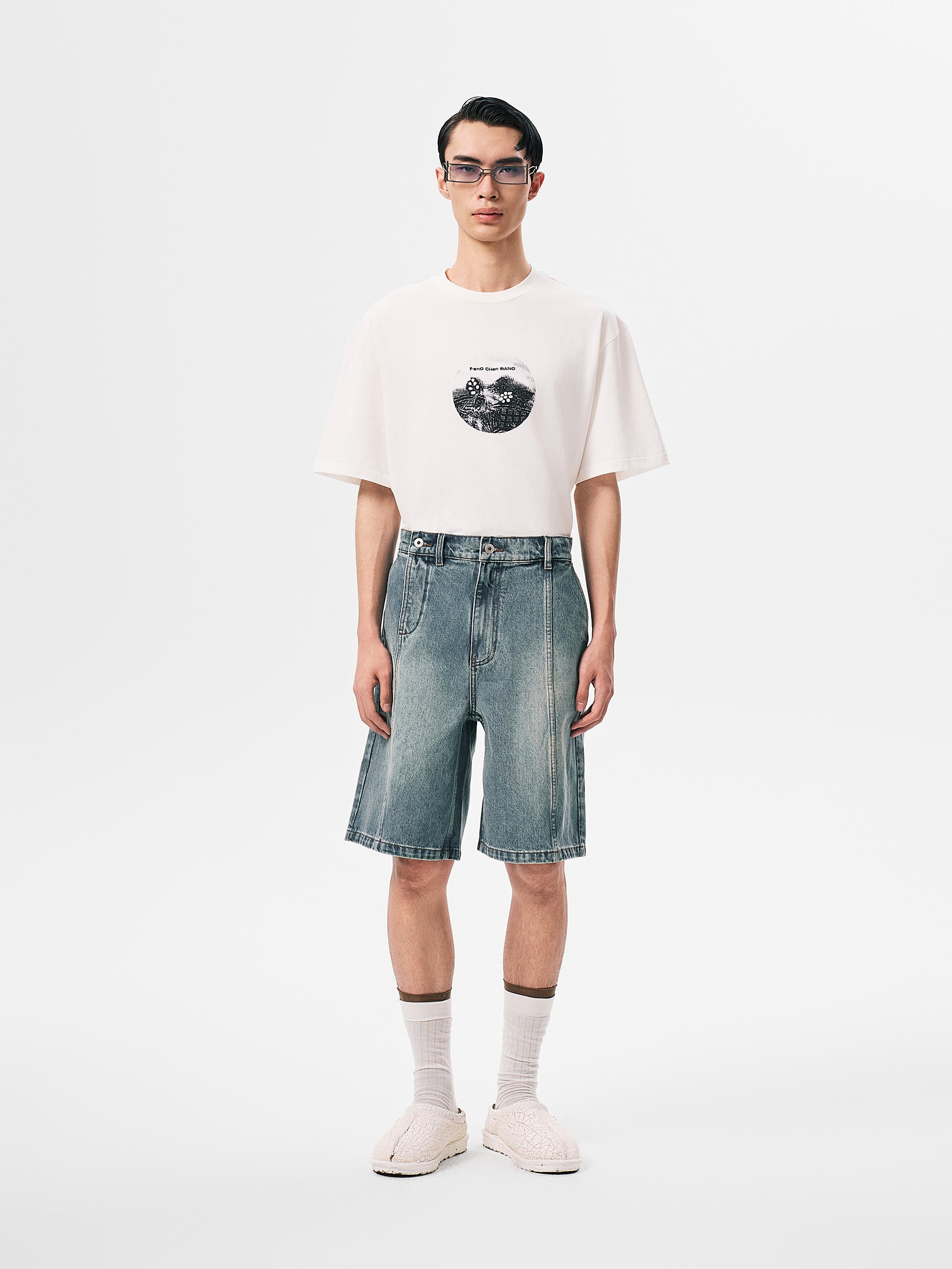 DECONSTRUCTED DENIM SHORTS