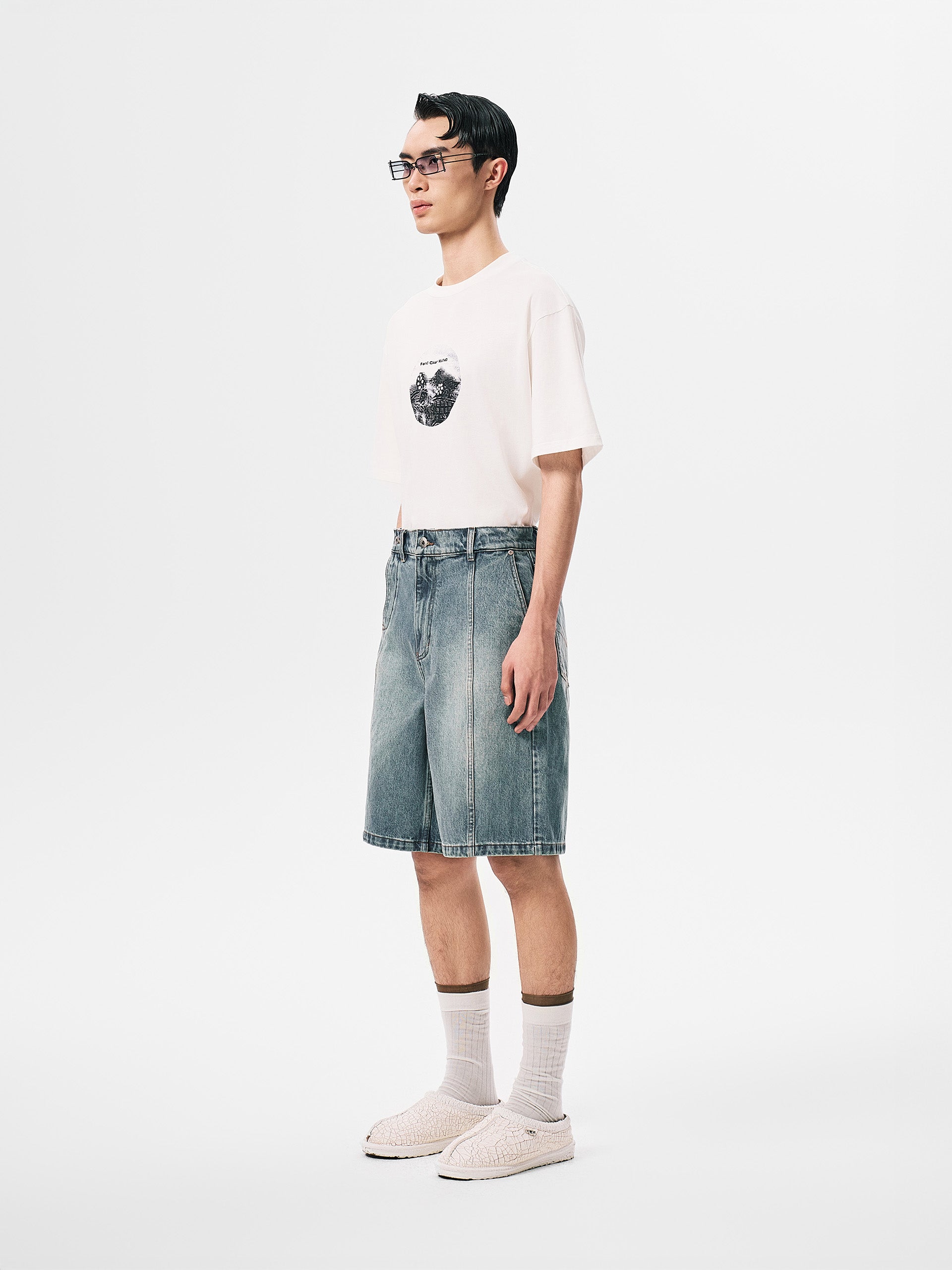 DECONSTRUCTED DENIM SHORTS