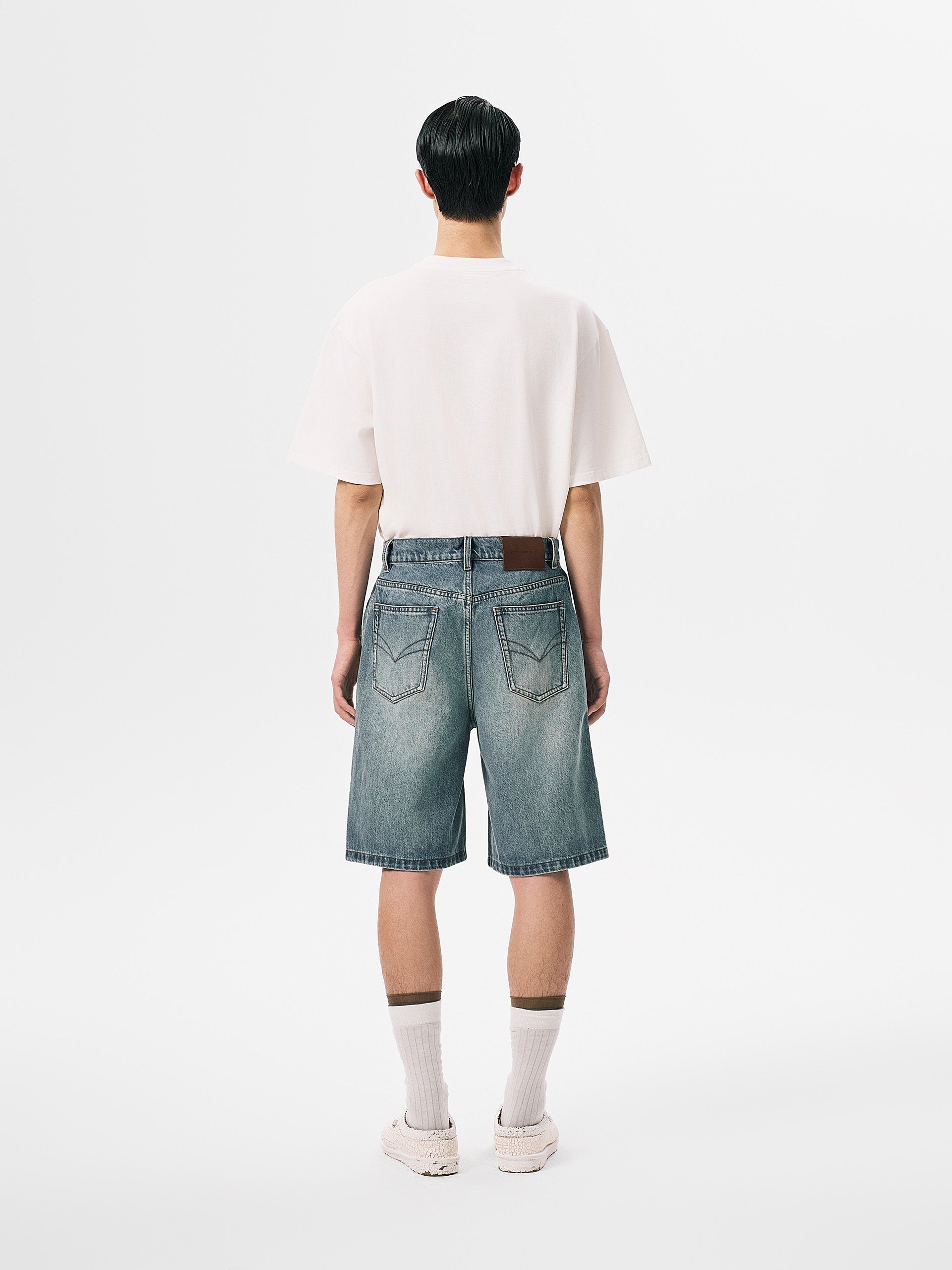 DECONSTRUCTED DENIM SHORTS