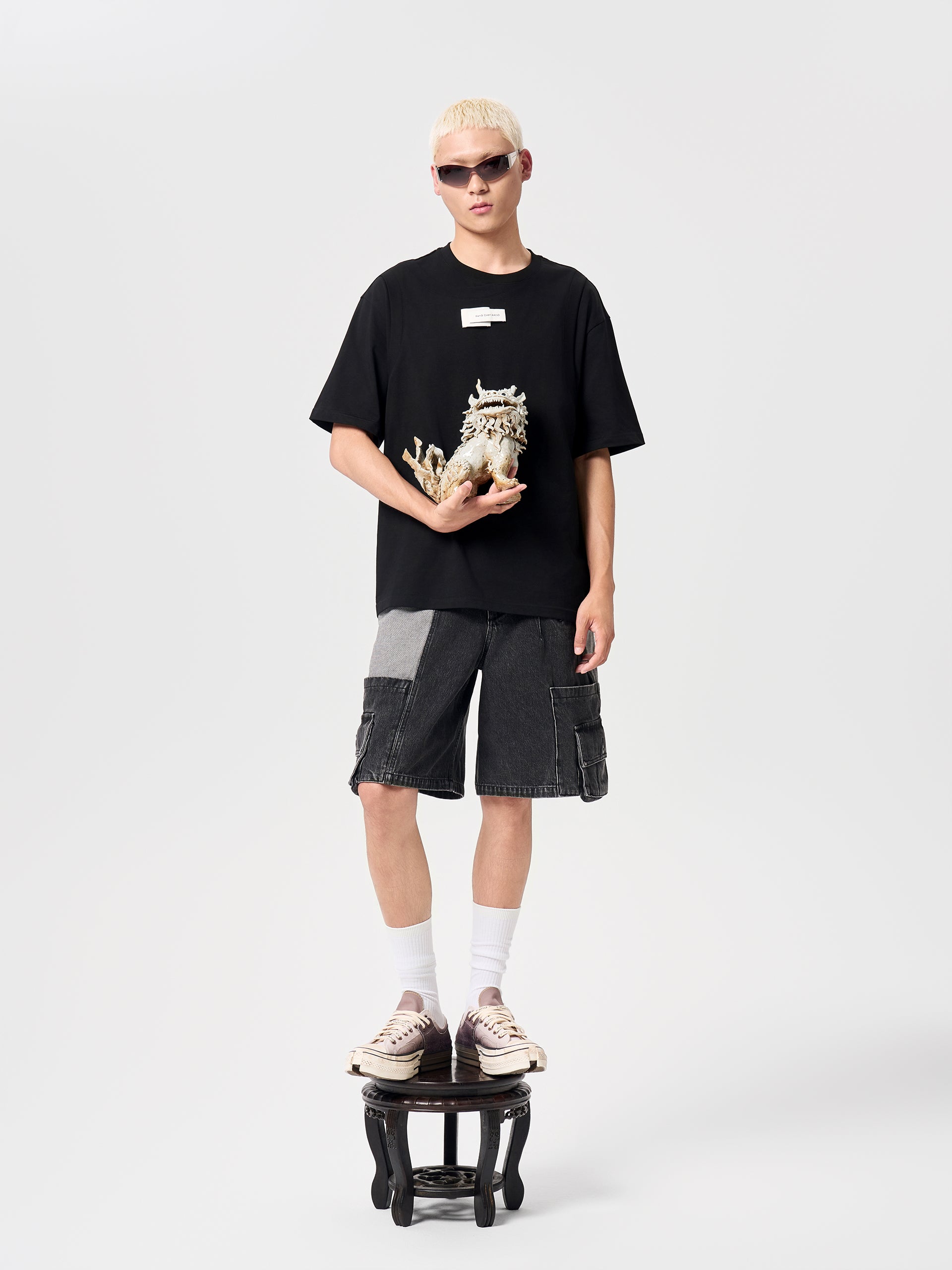 DECONSTRUCTED SLANTED PLACKET DENIM SHORTS