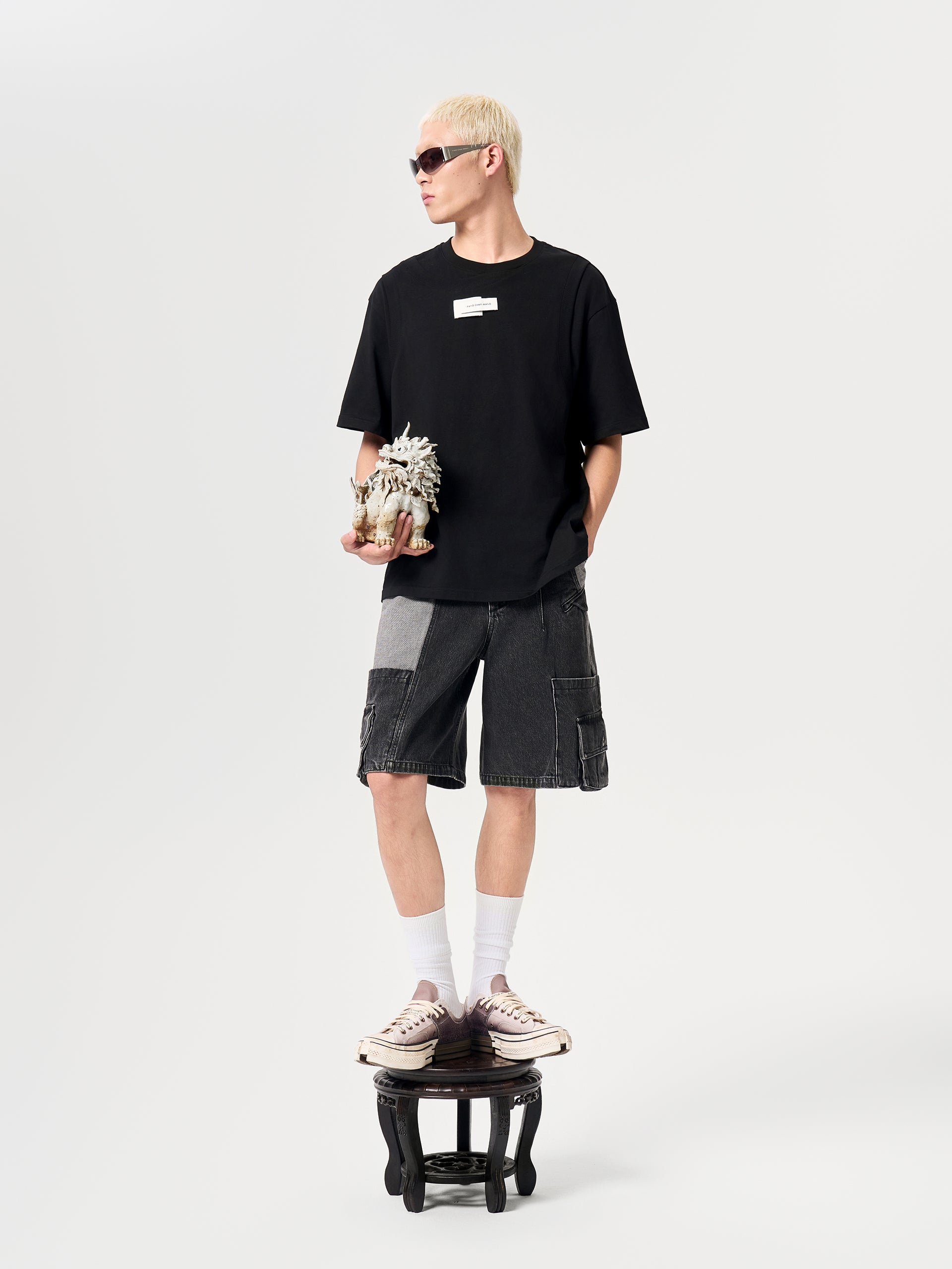DECONSTRUCTED SLANTED PLACKET DENIM SHORTS