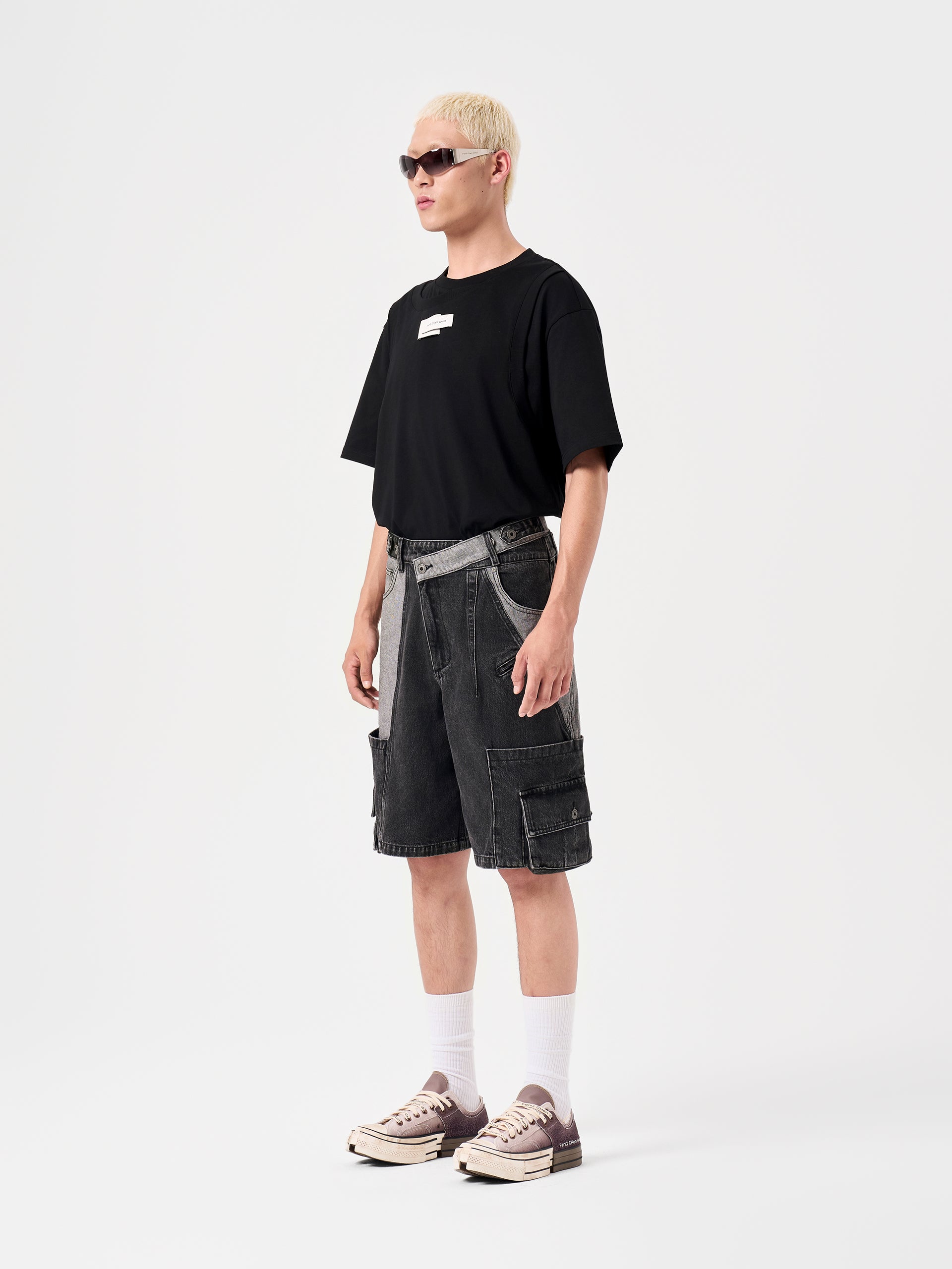 DECONSTRUCTED SLANTED PLACKET DENIM SHORTS