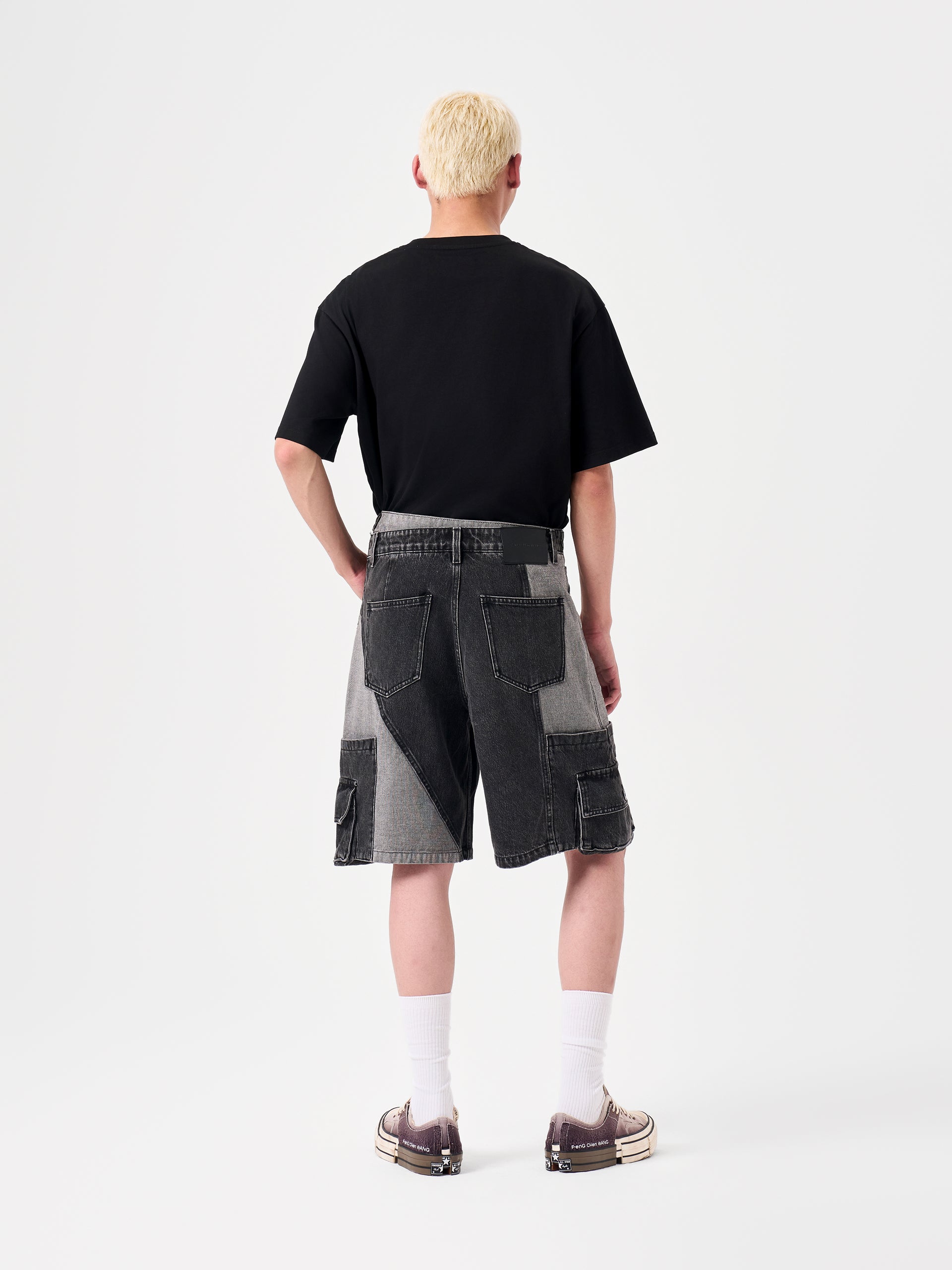 DECONSTRUCTED SLANTED PLACKET DENIM SHORTS