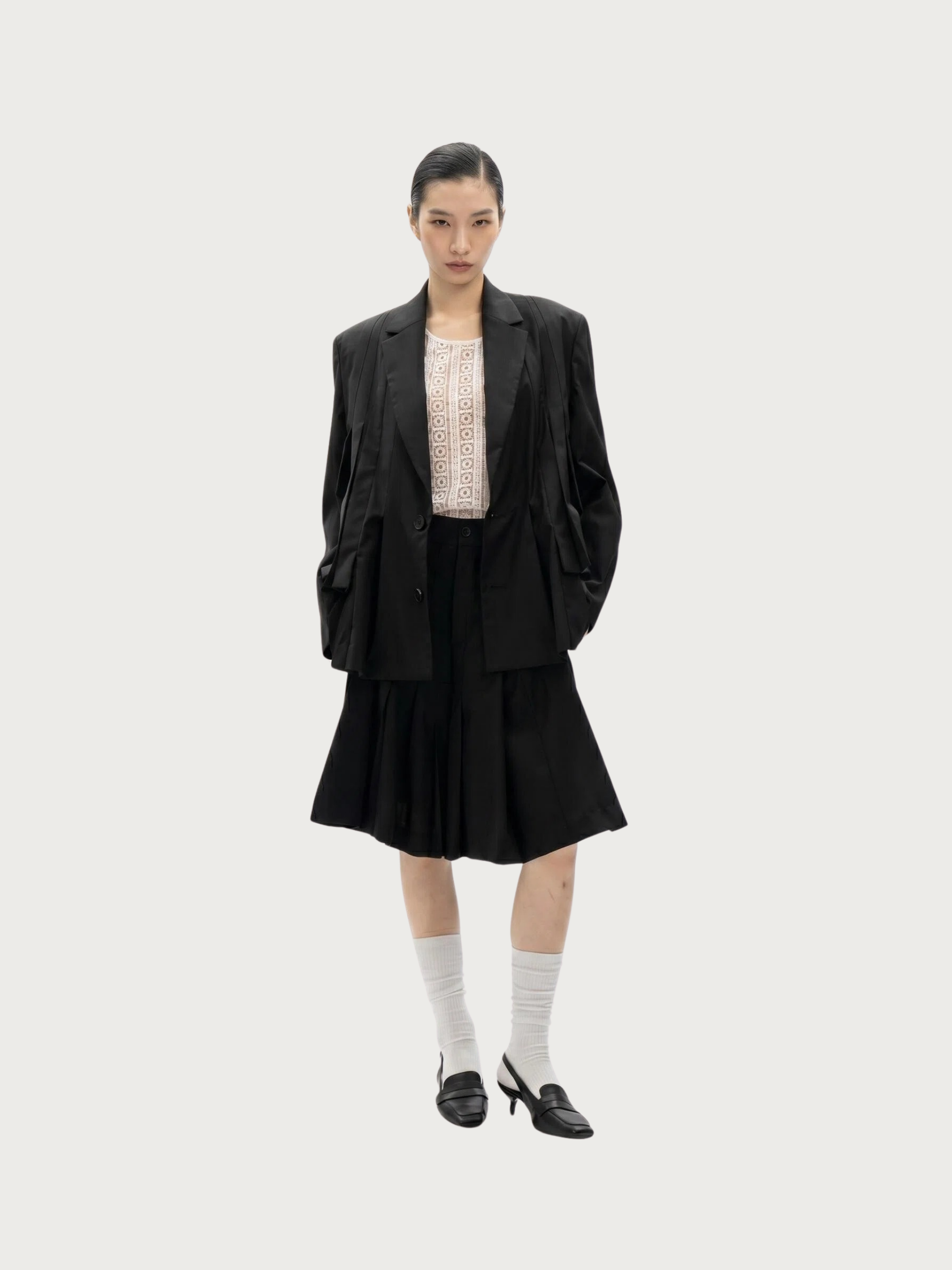 ILREGULAR PLEATS CROP TROUSERS