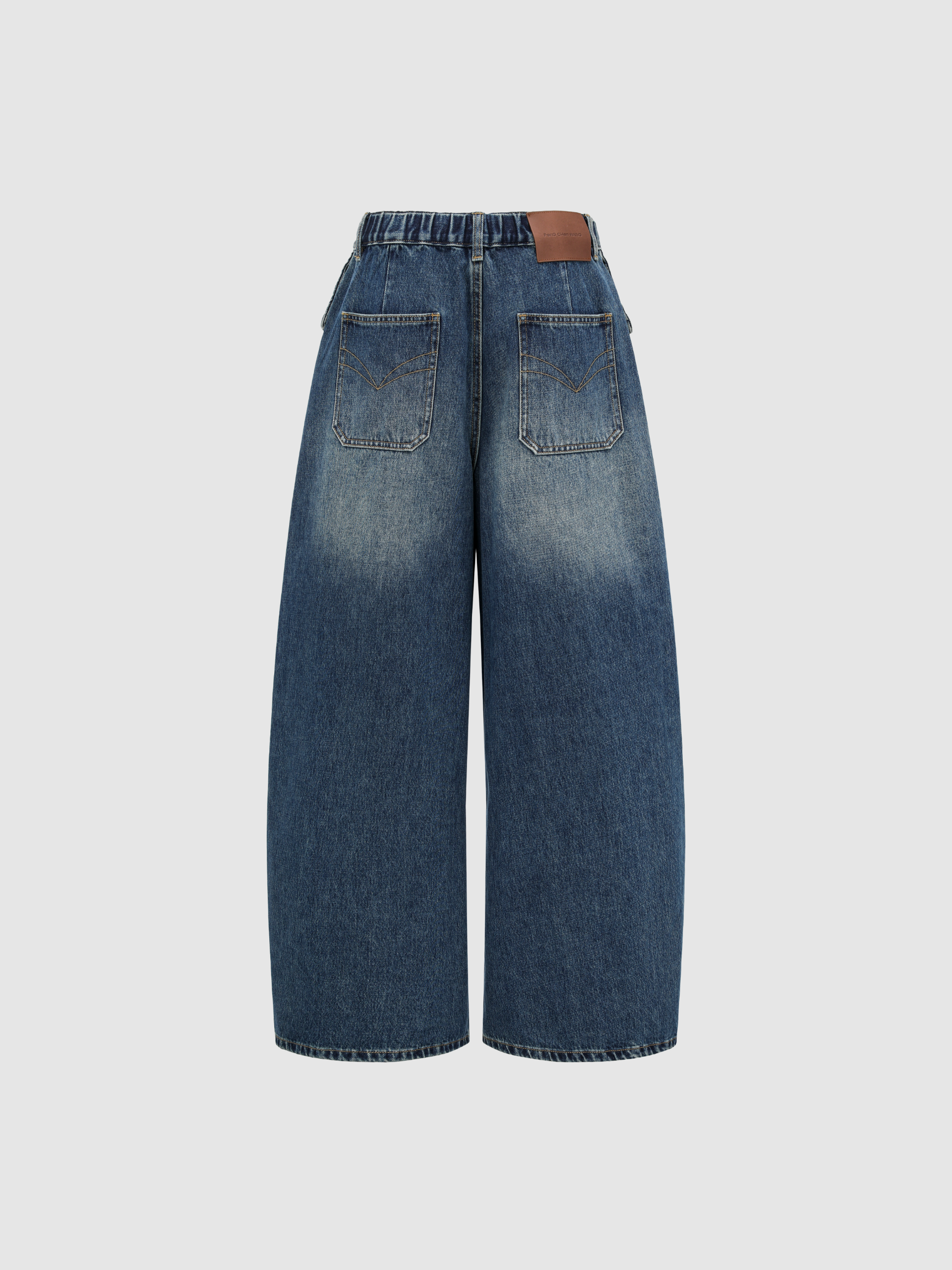 WASHED PLEATED OVERSIZED JEANS