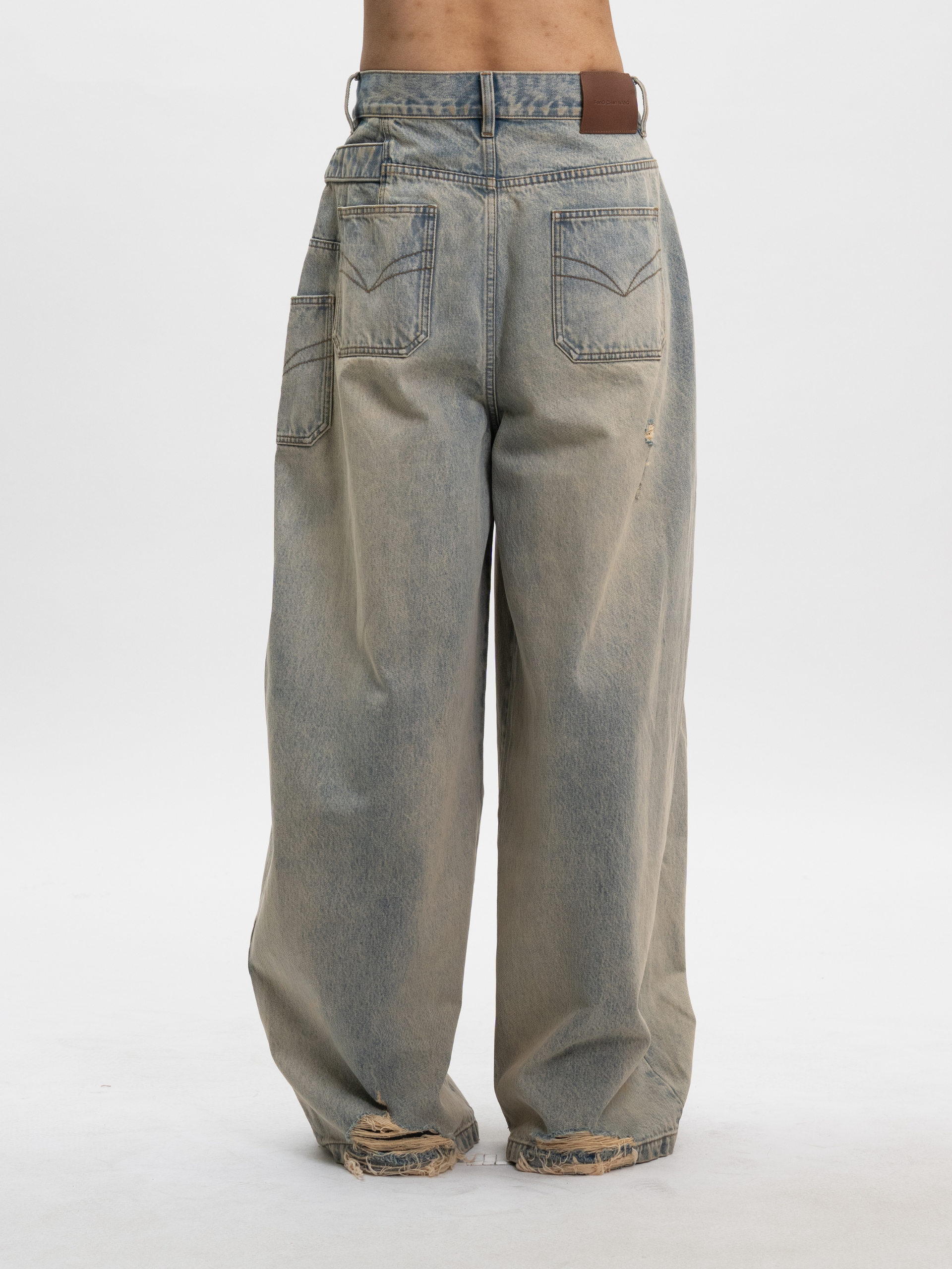 LIGHT BLUE WASHED DECONSTRUCTED DENIM PANTS