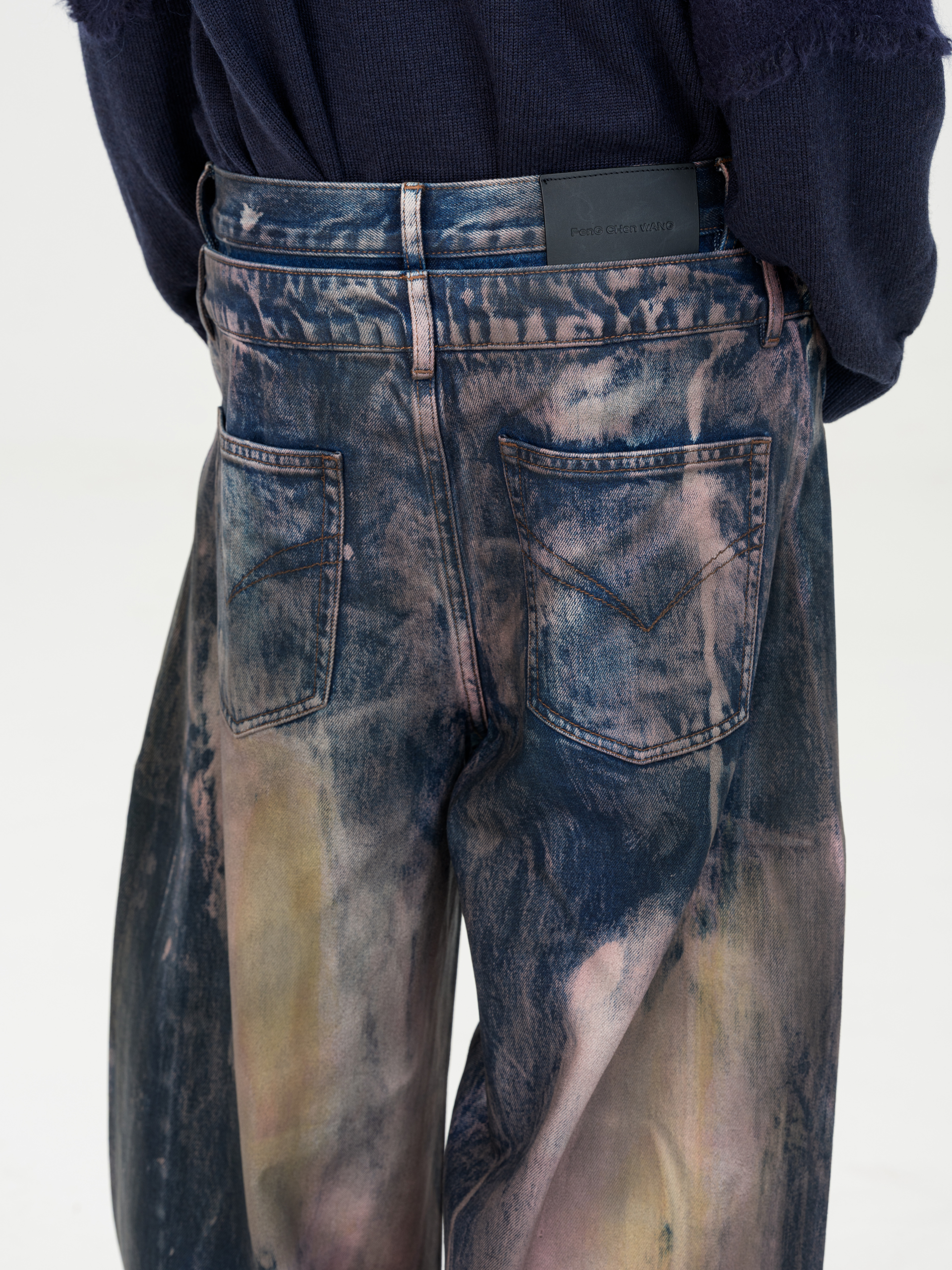 BROWN ARTISTICALLY TIE-DYED COATED DENIM PANTS