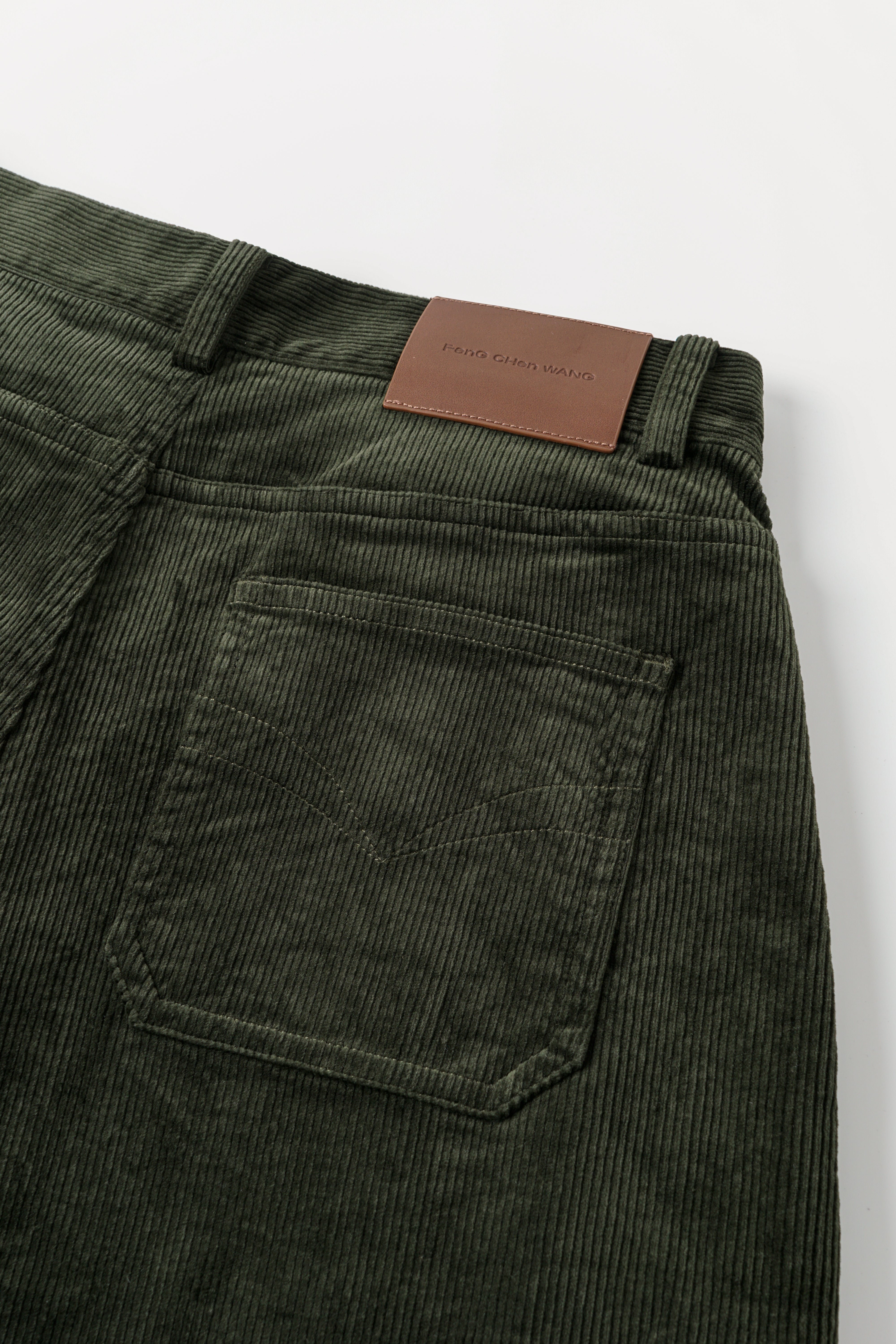 GREEN WASHED CORDUROY DECONSTRUCTED PANTS