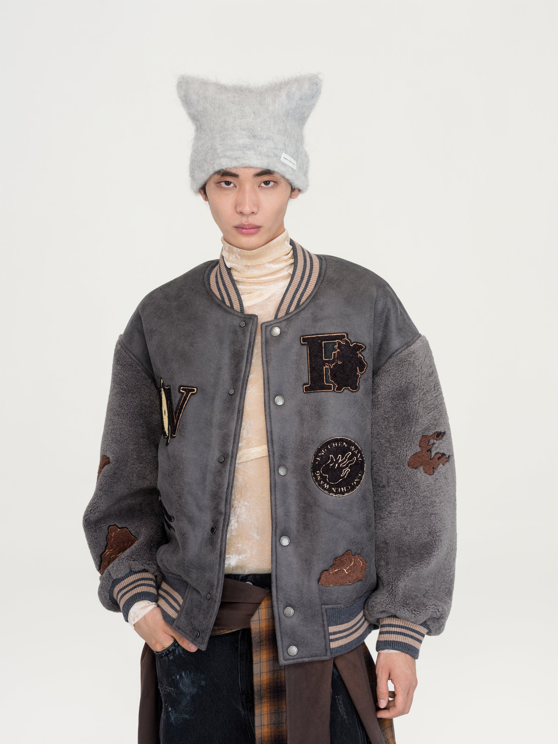FAUX SHEARLING BOMBER JACKET WITH BADGE PATCHES - Feng Chen Wang