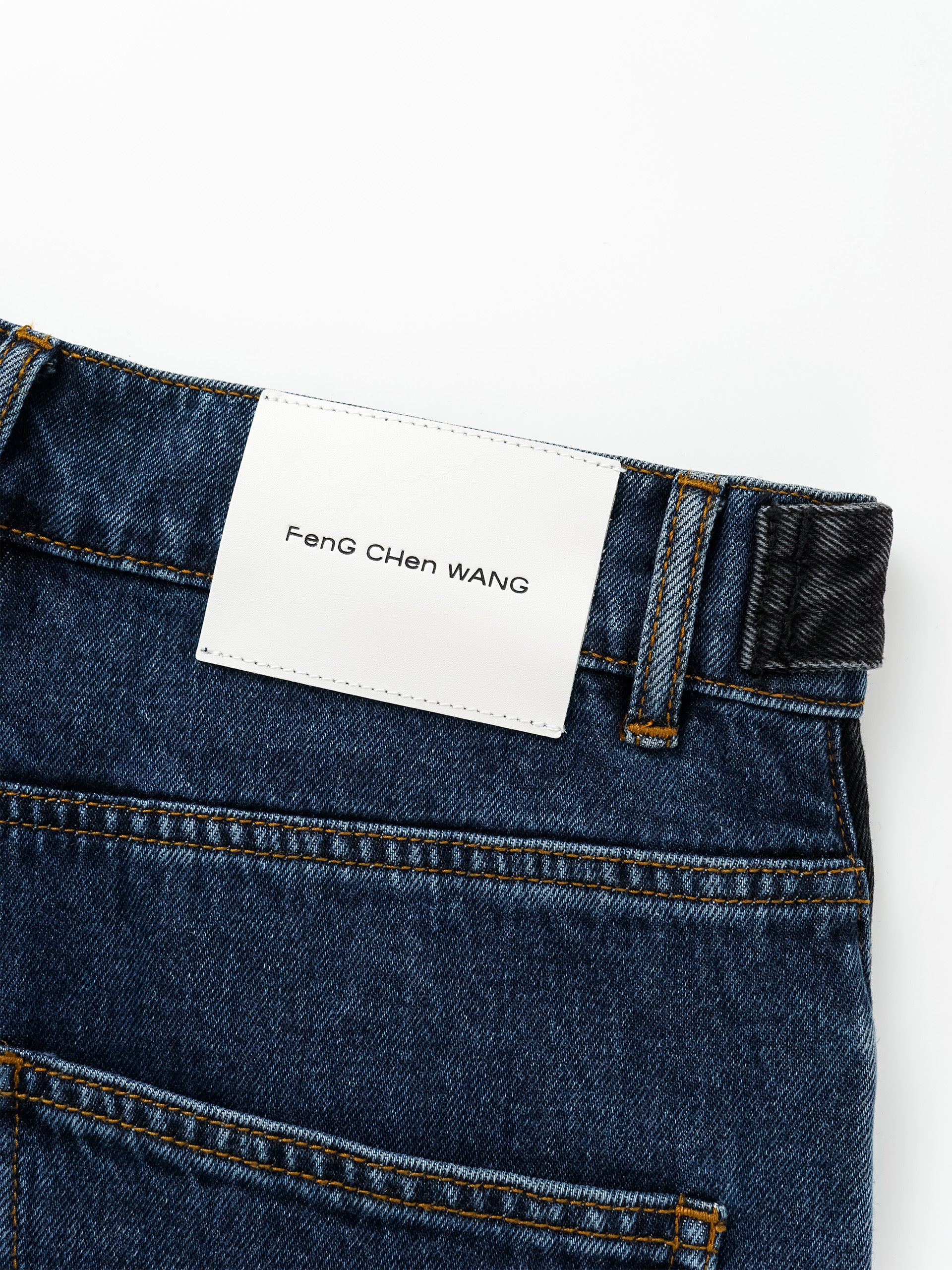DECONSTRCTED DENIM TROUSERS