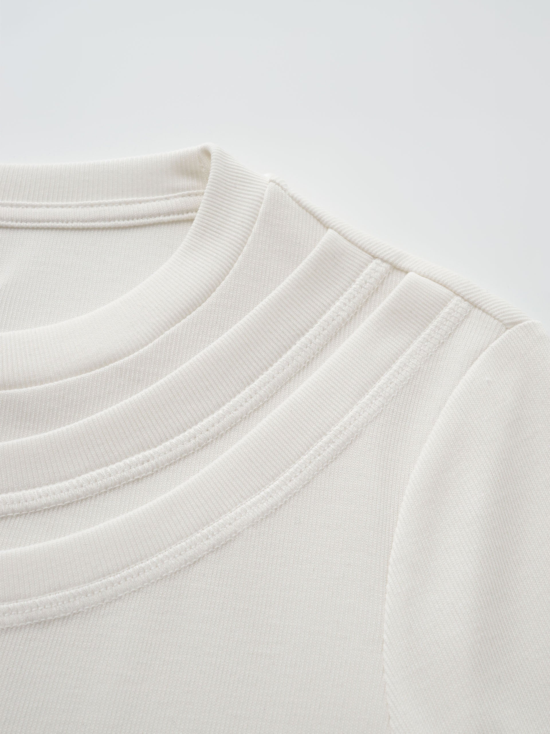 WHITE 2-IN-1 DECONSTRUCTED BASE LAYER TOP