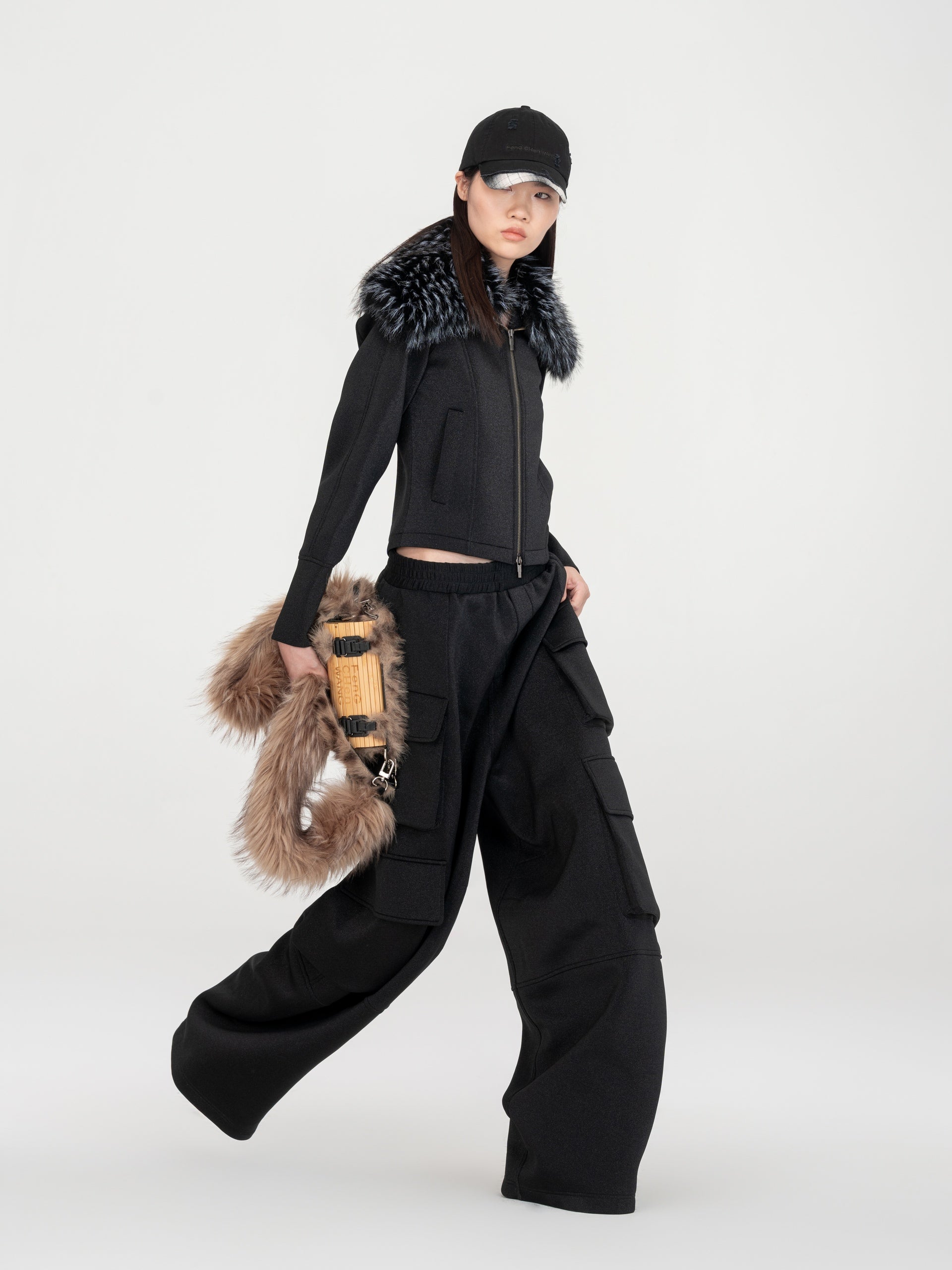 BLACK ZIP-UP TOP WITH DETACHABLE FAUX-FUR COLLAR