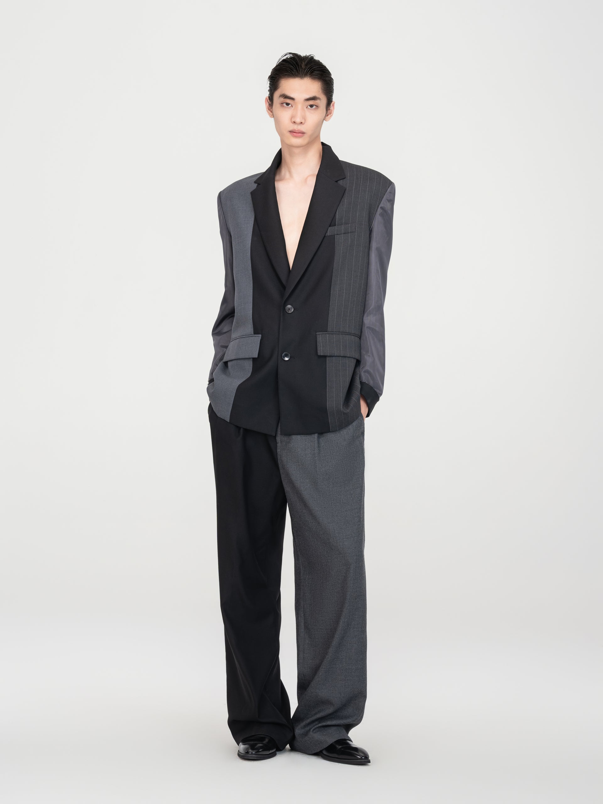 BLACK AND GREY PANELED BLAZER WITH INVERTED STRIPE SLEEVES